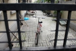 Parked Bicycle in an Empty Alley, Shanghai, China