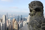 Stone Fu Lion Overseeing Downtown Hong Kong, China